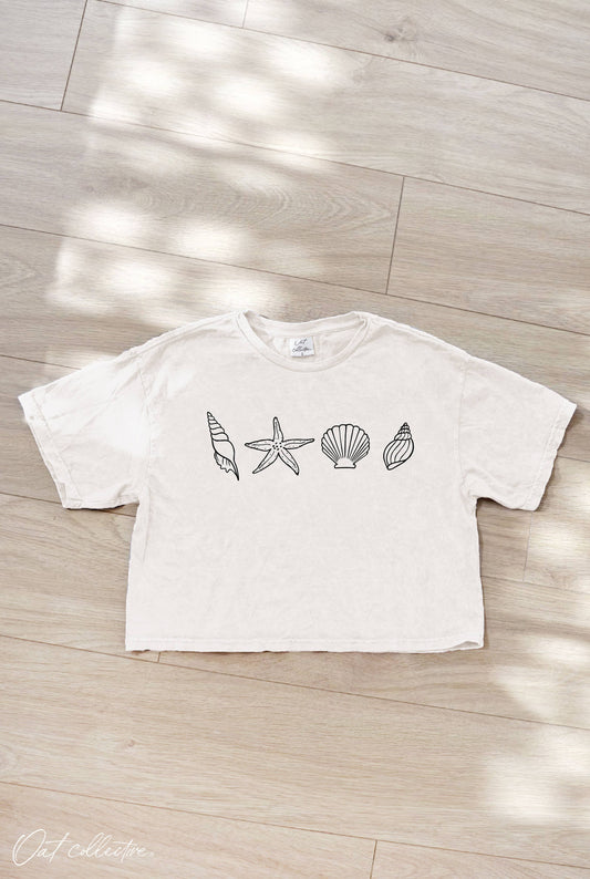 SEASHELLS ROW Cropped Mineral Washed Graphic Top: CREAM